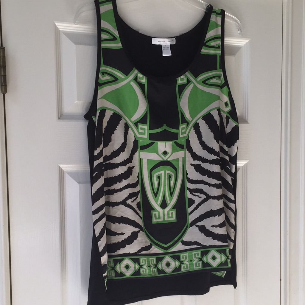 August Silk Pullover Shell. 100% Polyester